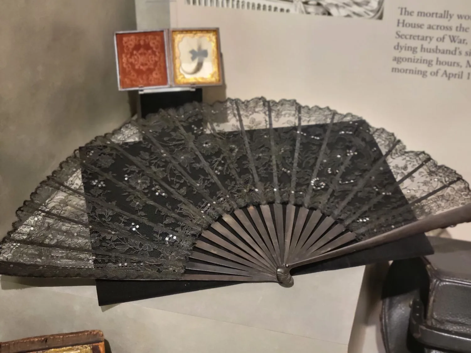 Mary Lincoln's black lace mourning fan in a display case.